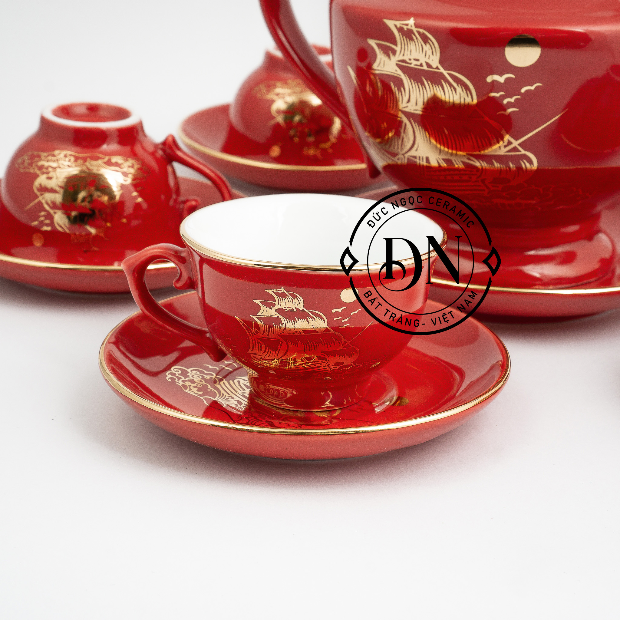 Bộ ấm trà sứ Thuận Buồm Xuôi Gió men đỏ kẻ vàng kim sang trọng - ấm chè Bát Tràng quà tặng đẹp cao cấp