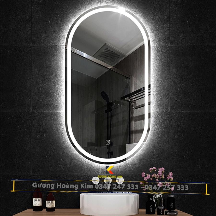 gương cảm ứng đèn led treo tường oval elip bầu dục nhà tắm phòng wc trang điểm makeup decor phôi gương bỉ AGC cao cấp kích thước 50x90cm và 60x100cm guonghoangkim mã HK-2006