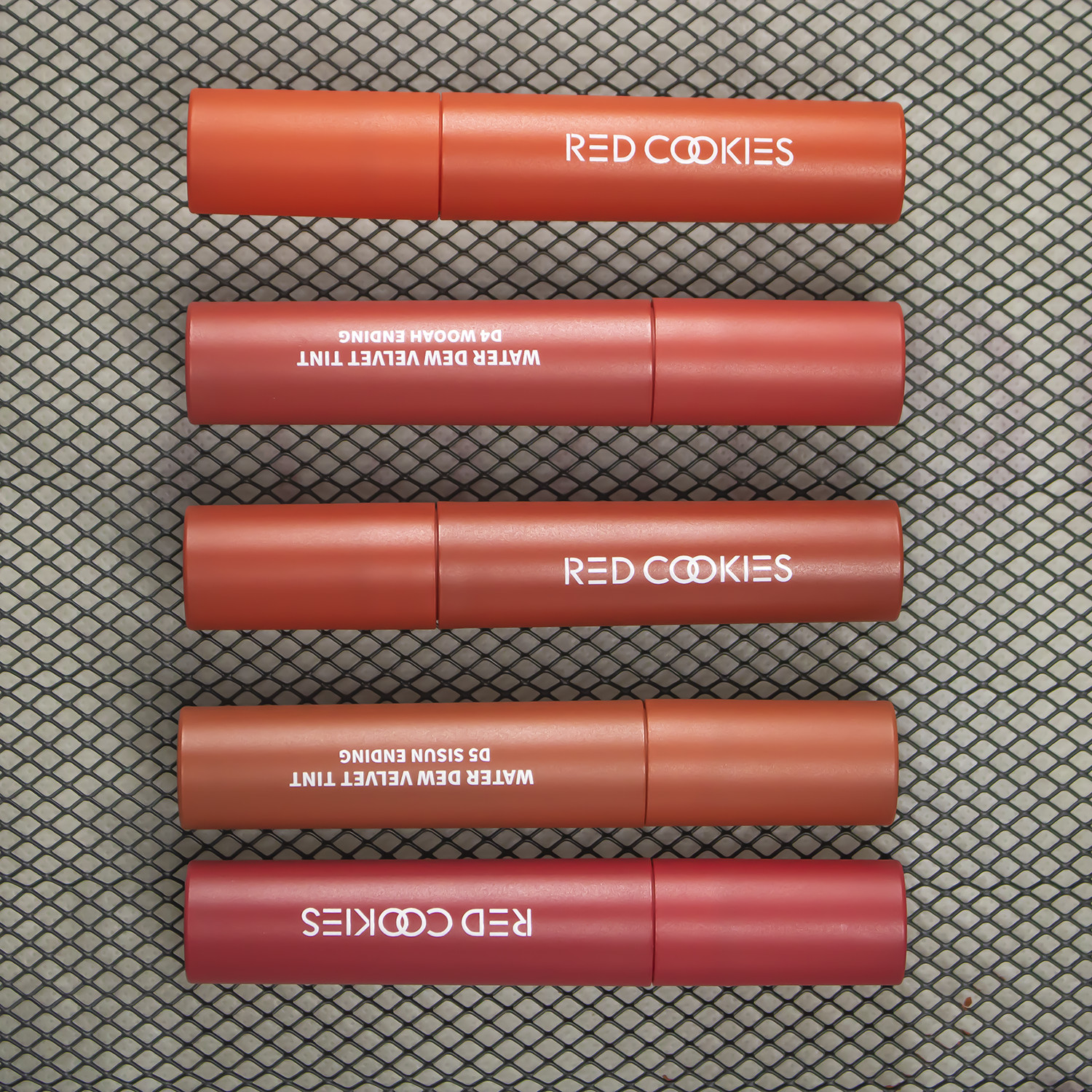 Son Lì Red Cookies Water Dew Velvet Tint Hàn Quốc Màu D1 - Đỏ Cam (4gr )