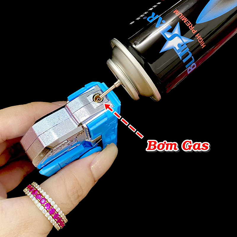 Bật Lửa Khè Súng Cà Rốt Con Quay 3in1 - Xài Gas