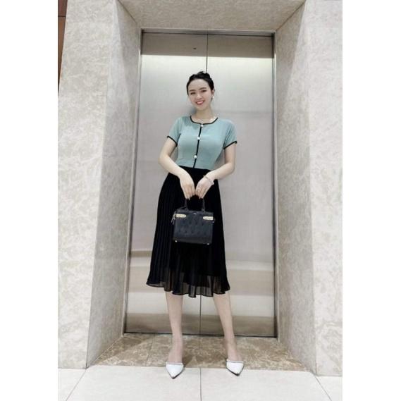 ĐẦM XÒE VIỀN ĐEN PHỐI NÚT HẠT CHÂN VÁY DẬP LY