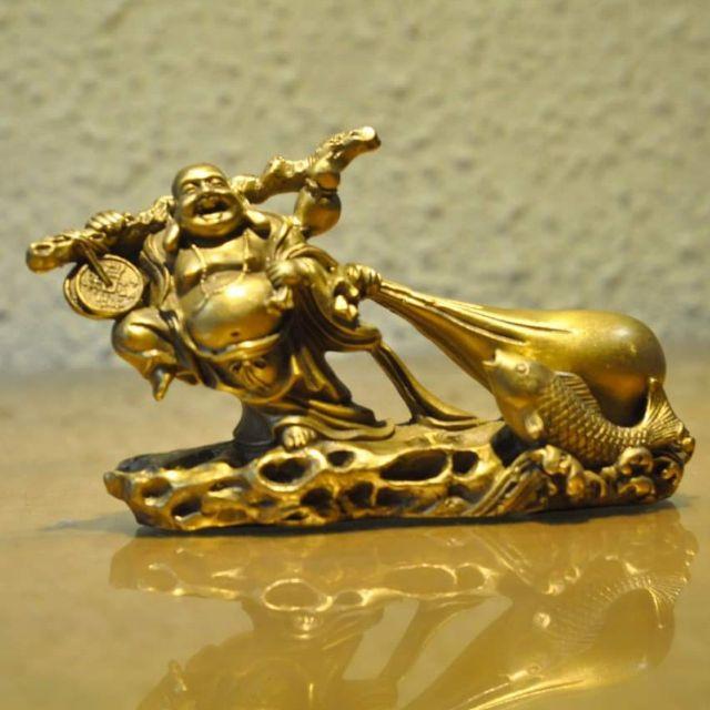 Tượng phật Di lặc kéo túi bằng đồng.