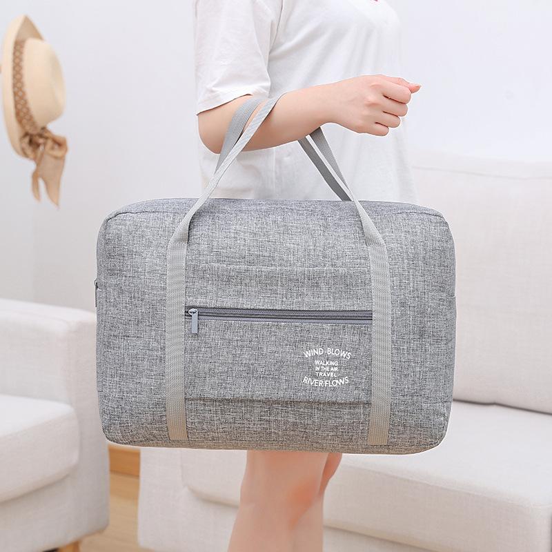 Túi du lịch xách tay siêu lớn chống thấm nước có thể gập lại cho nam và nữ Chuyến công tác ngắn Túi du lịch một vai Túi hành lý xe đẩy