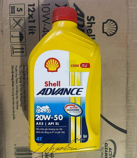 Shell ax5 20w-50. 1L . Shell vàng cho xe chở nặng (chuyên shipper giao hàng)
