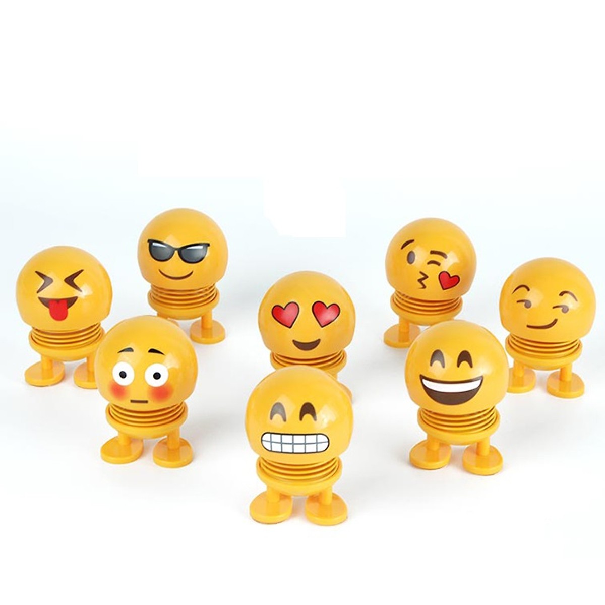 Emoji lò xo lắc đầu thú nhún mặt cười cảm xúc để trên xe, trên bàn