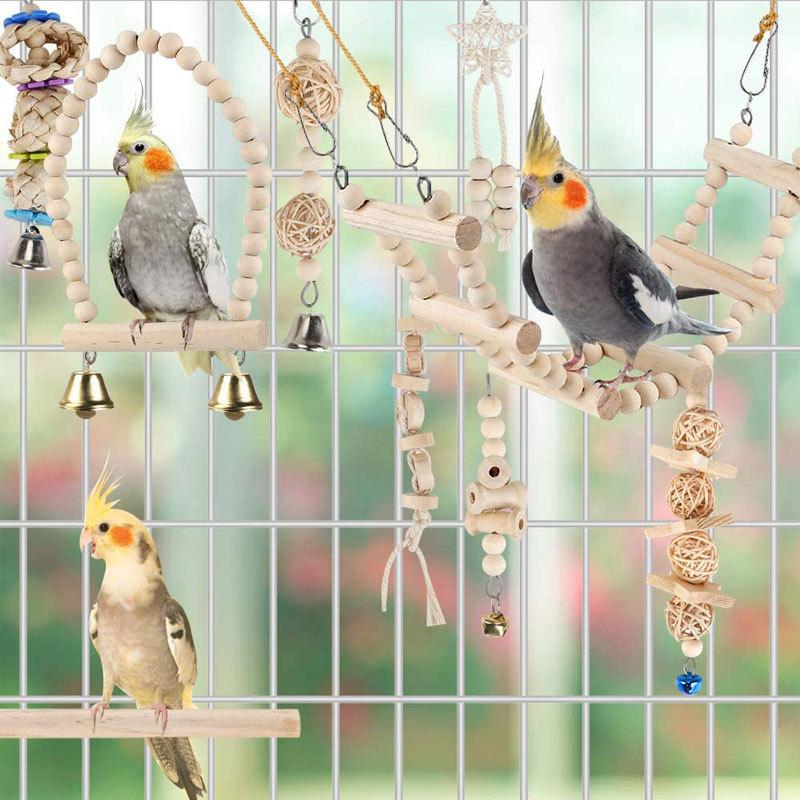 Đồ chơi vẹt đuôi dài Một mẻ đĩa chín vẹt đuôi dài được làm bằng gỗ tự nhiên được dùng cho những cái lồng vẹt, tổ, xích đu, dây chuyền và vẹt nhỏ để nhai đồ chơi