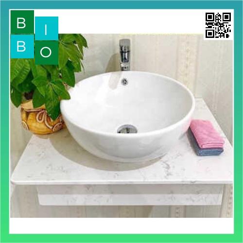 Lavabo tròn đặt bàn màu trắng