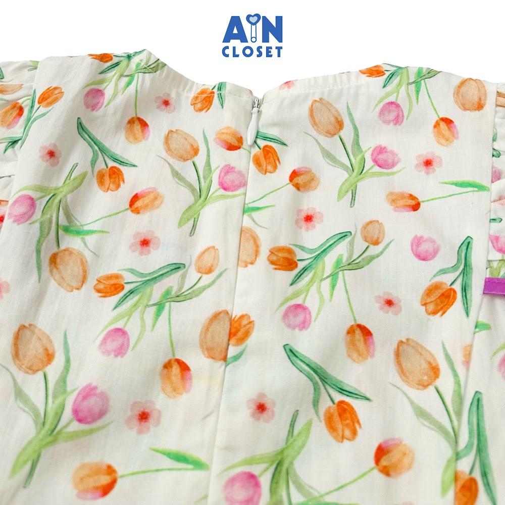 Đầm bé gái họa tiết Tulip Cam Viền Tím cotton - AICDBGDKS94K - AIN Closet