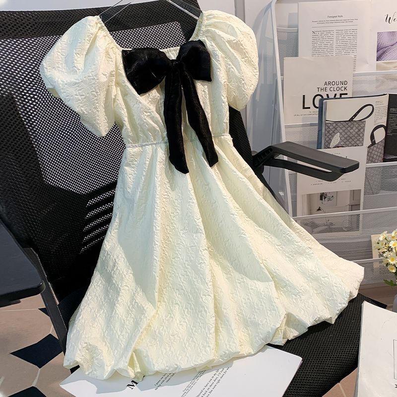 DONGSHOP HOT Cô gái bong bóng nước ngoài tay áo đầm mùa hè 2023 Hàn Quốc trẻ em Bowknot váy công chúa váy mùa hè