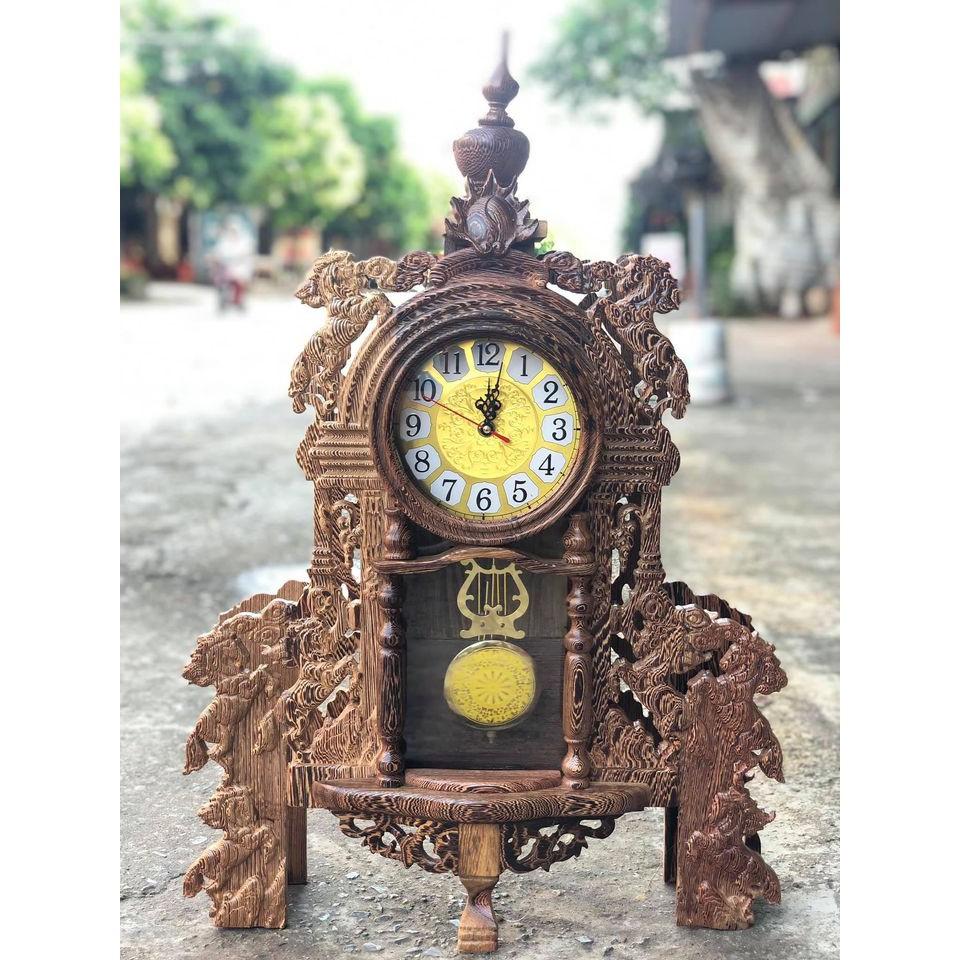 Đồng hồ mun đuôi công (kt 74 x 46 x 15cm)