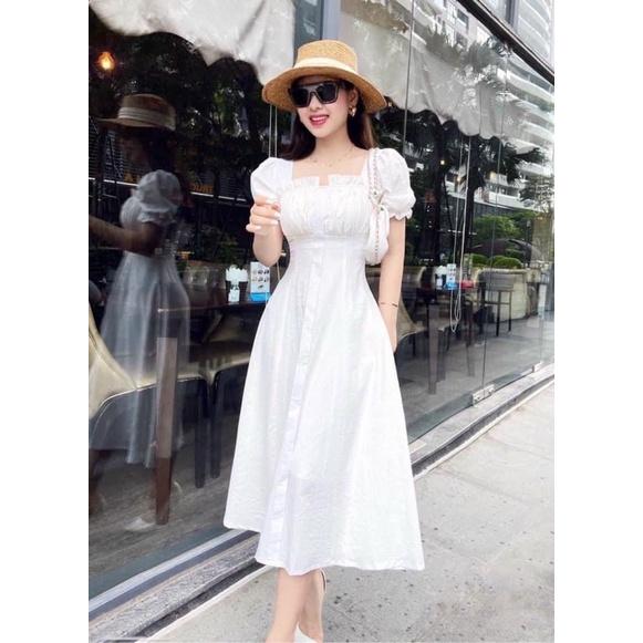 Đầm trắng cổ vuông nhúng ngực