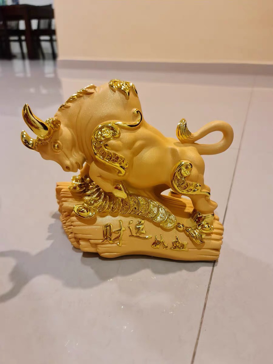 Bò Tài Chính, Bò vàng linh vật mang lại may mắn vài tài lộc, đặc biệt trong kinh doanh và đầu tư tài chính, Mã T101