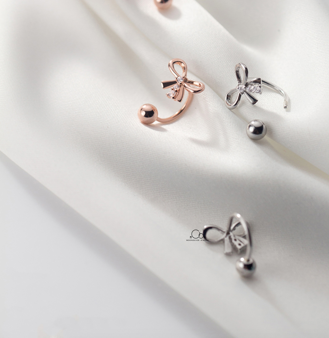 Khuyên tai nơ chốt bi