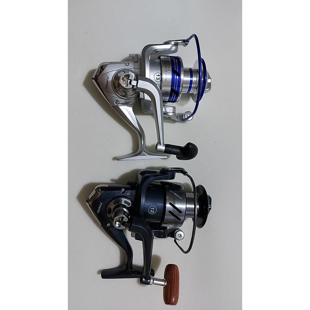 Cần rút huntman vơi máy yomoshi.cần rút.cần câu huntman.cần câu bạo lực