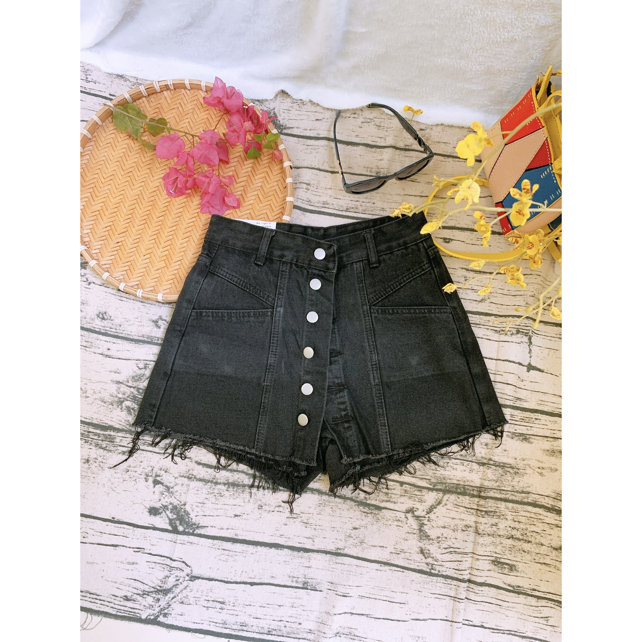Quần váy jeans ngắn cái nút dọc thân trước