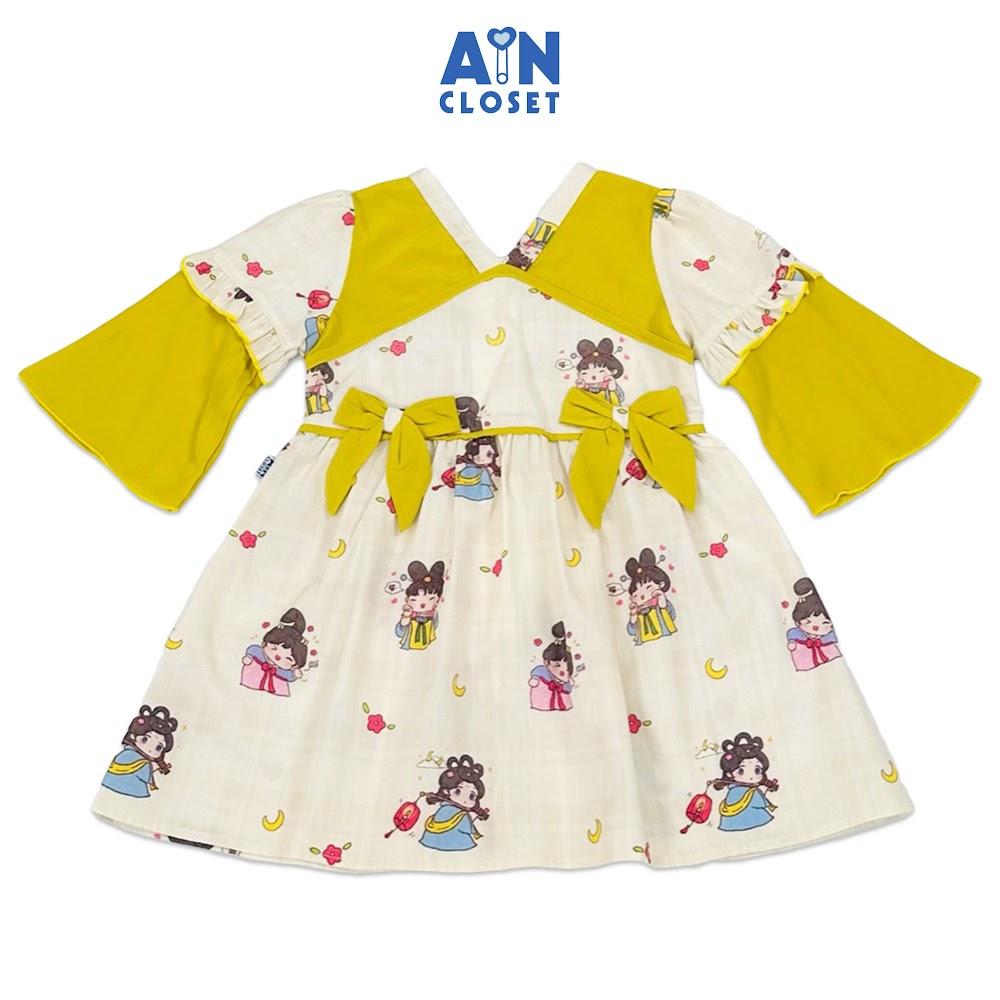 Đầm tay lỡ bé gái họa tiết Tiên Nữ Nơ Vàng cotton - AICDBG8HGXW3 - AIN Closet