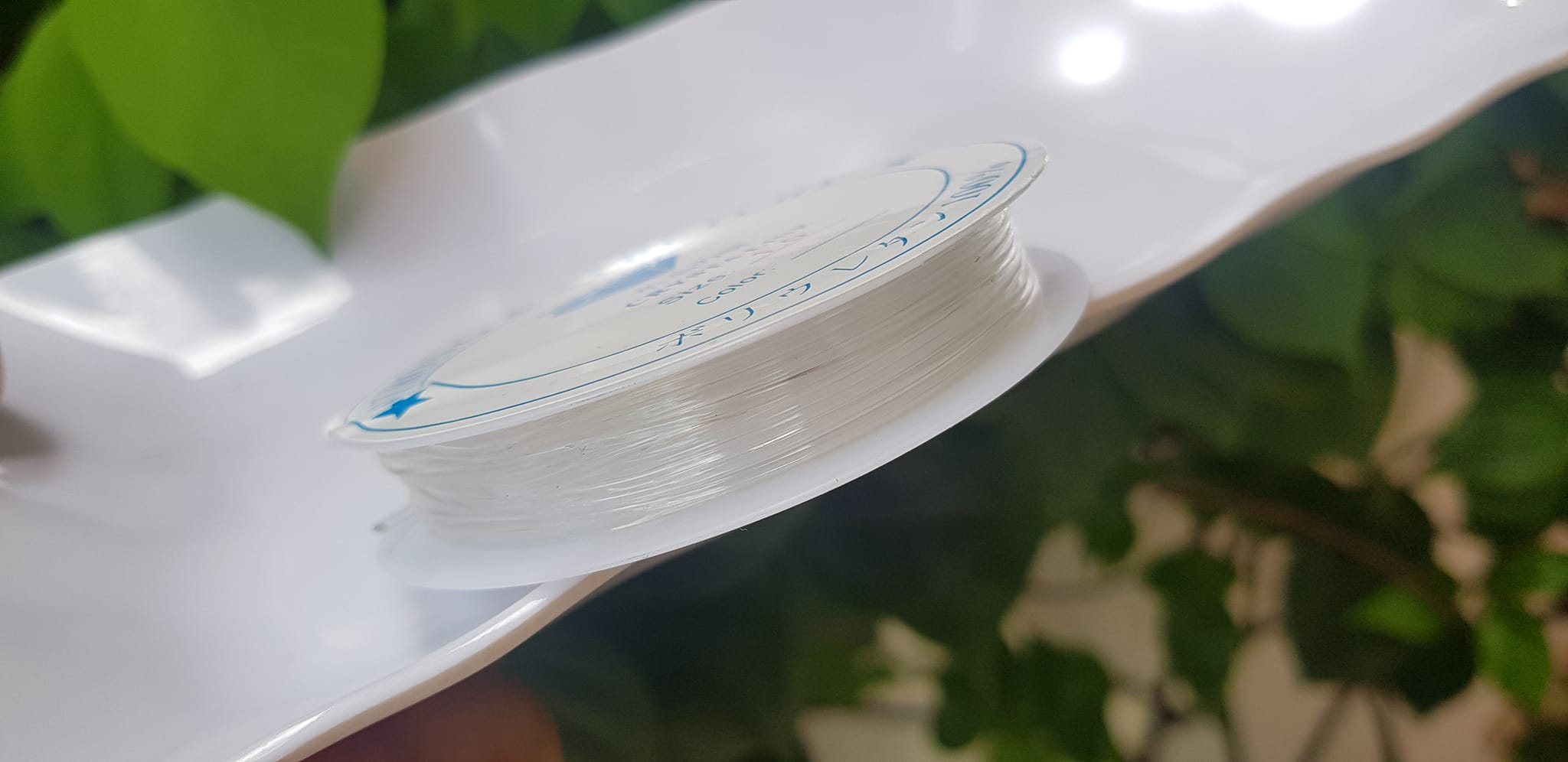 Khoanh tròn cuộn Thun Dẻo Màu trắng nhỏ chuyên xỏ tất cả vòng đeo tay Thun dẻo trắng xỏ vòng tay nam nữ ạ