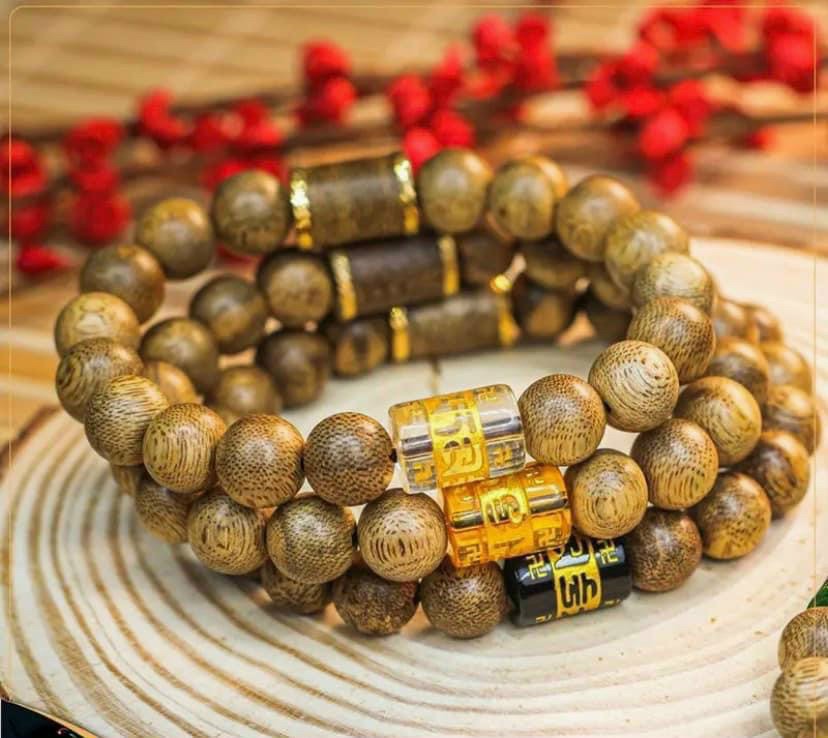 Vòng Tay Trầm Hương Mix Charm Hạt Tròn