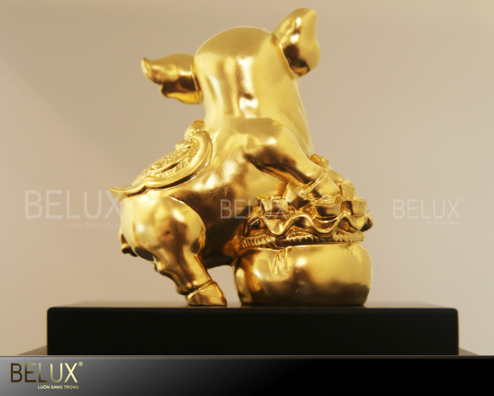Tượng heo ôm hũ vàng dát vàng 24K