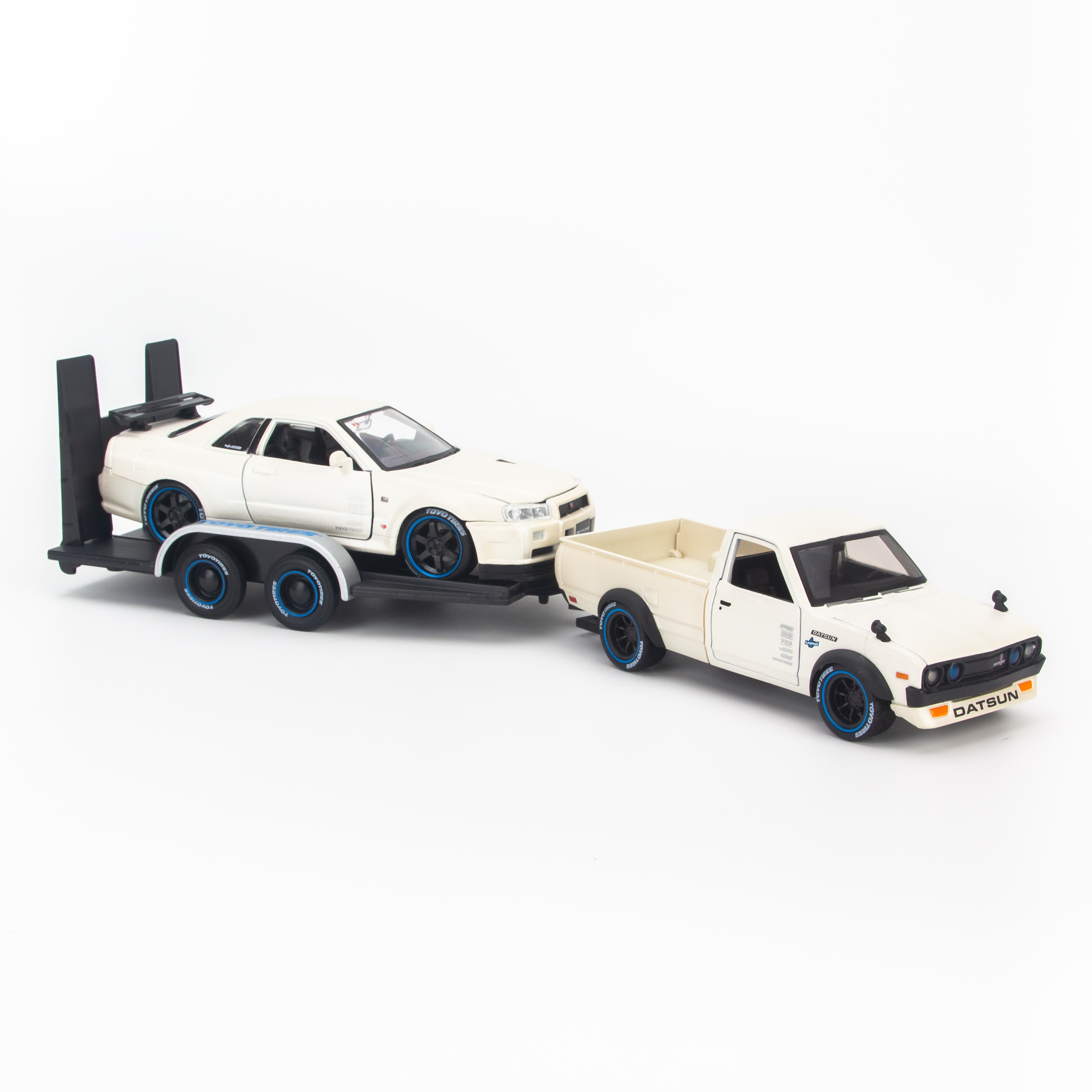 Mô hình xe Design Elite Transport - Nissan Datsun 73 Pick up + Skyline R34 1:24 Maisto - 32754