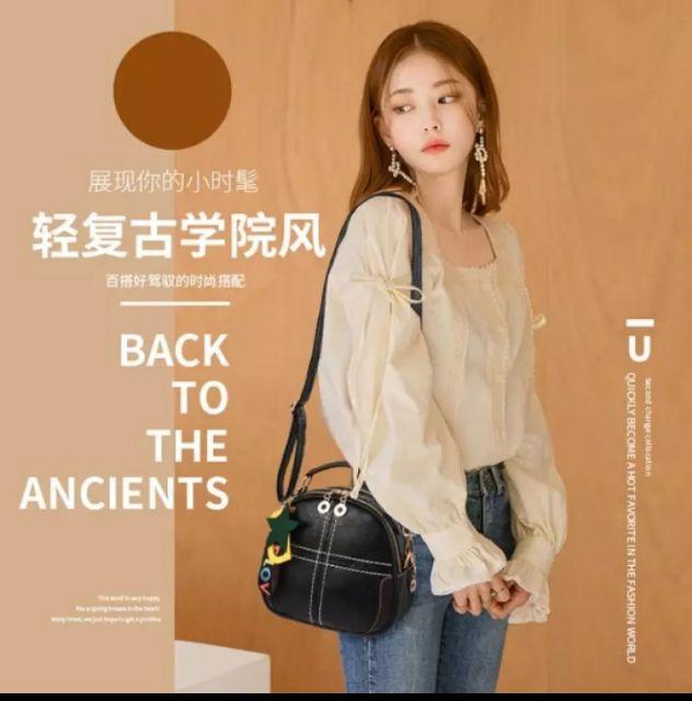 Balo túi 2 ngăn chần chỉ kèm phụ kiện thời trang.