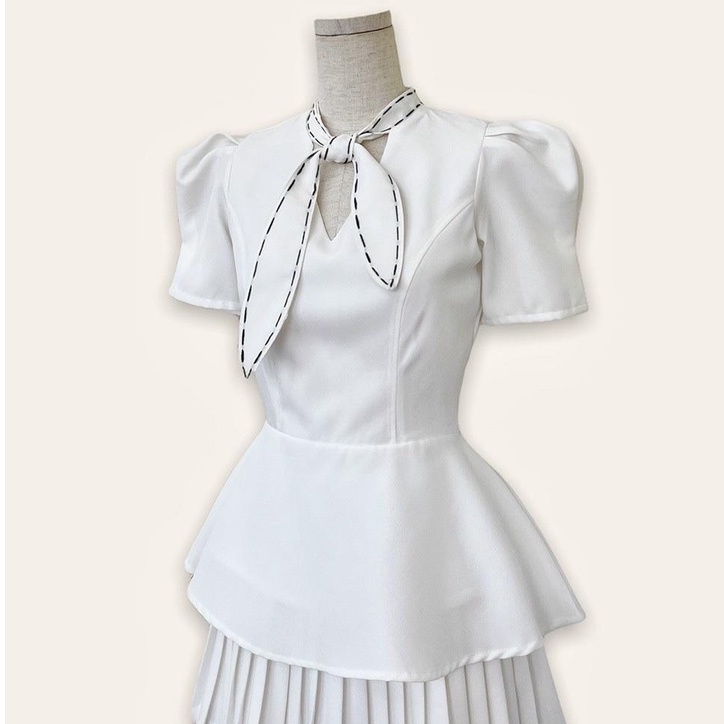 Áo peplum chỉ nổi cột nơ cổ điệu đà, sang trọng