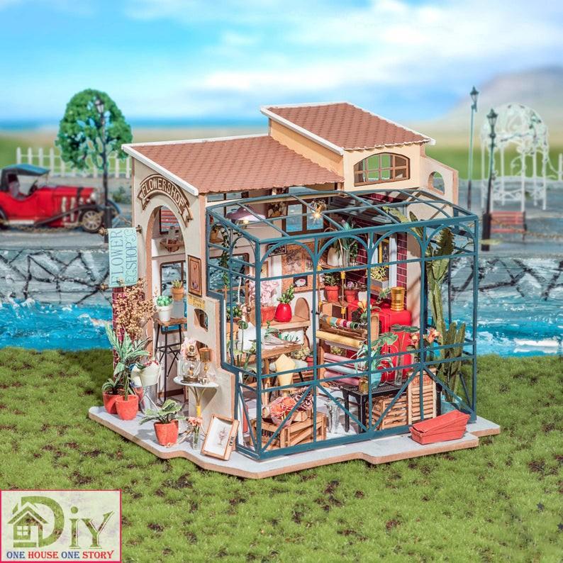 Mô hình nhà tự lắp ráp bằng gỗ Dollhouse EMILY'S FLOWER SHOP -  mã DG145 (Kèm nhíp + keo)