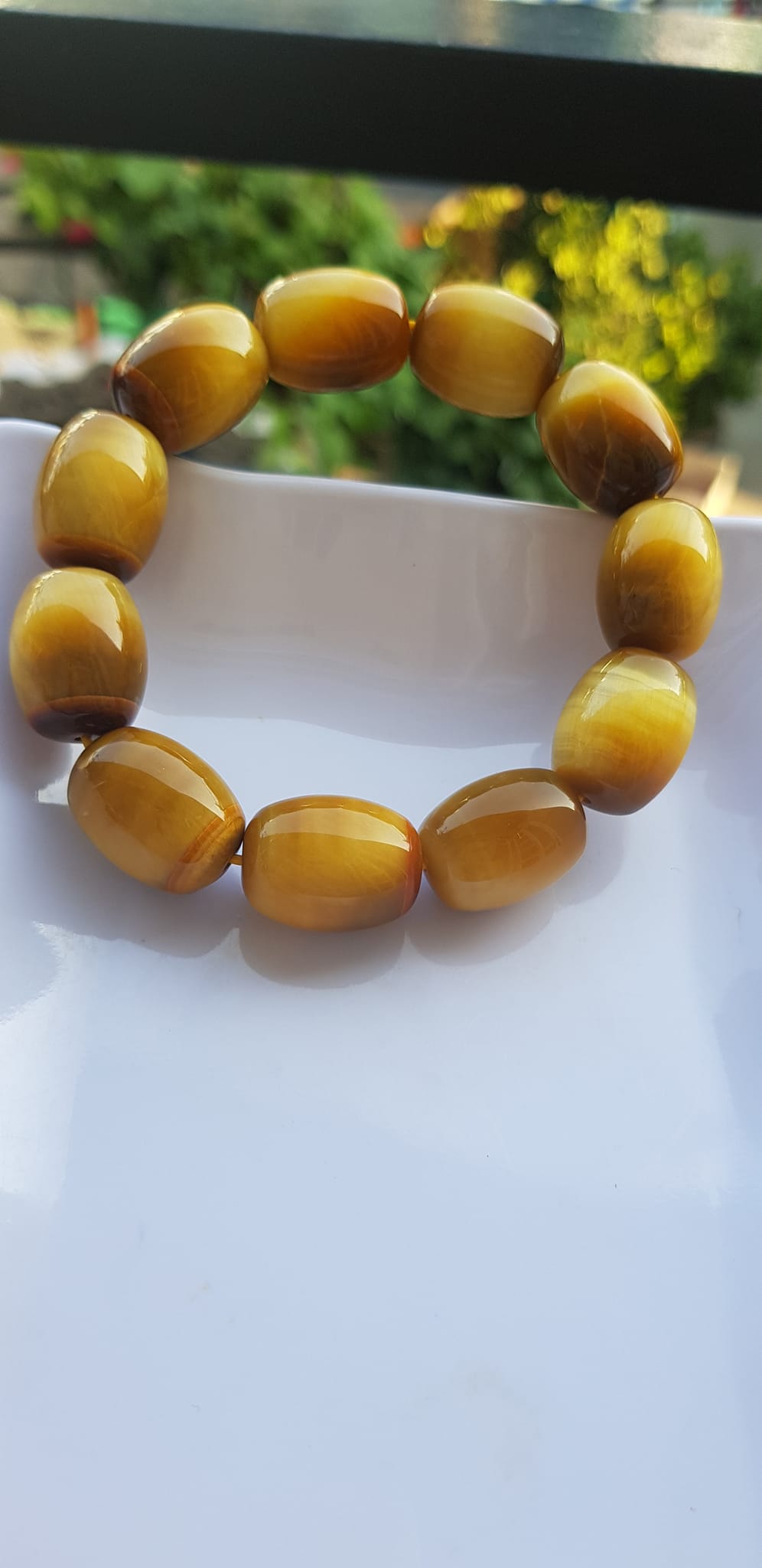 Vòng Tay Phong Thủy Nam Mệnh Thổ Kim Thủy Mới Đẹp Hạt Lu Thống Mới Vàng Nâu bóng đẹp Chất liệu đá mắt hổ tự nhiên vàng nâu bóng đẹp ạ Size hạt 14mm x dài 19mm ạ