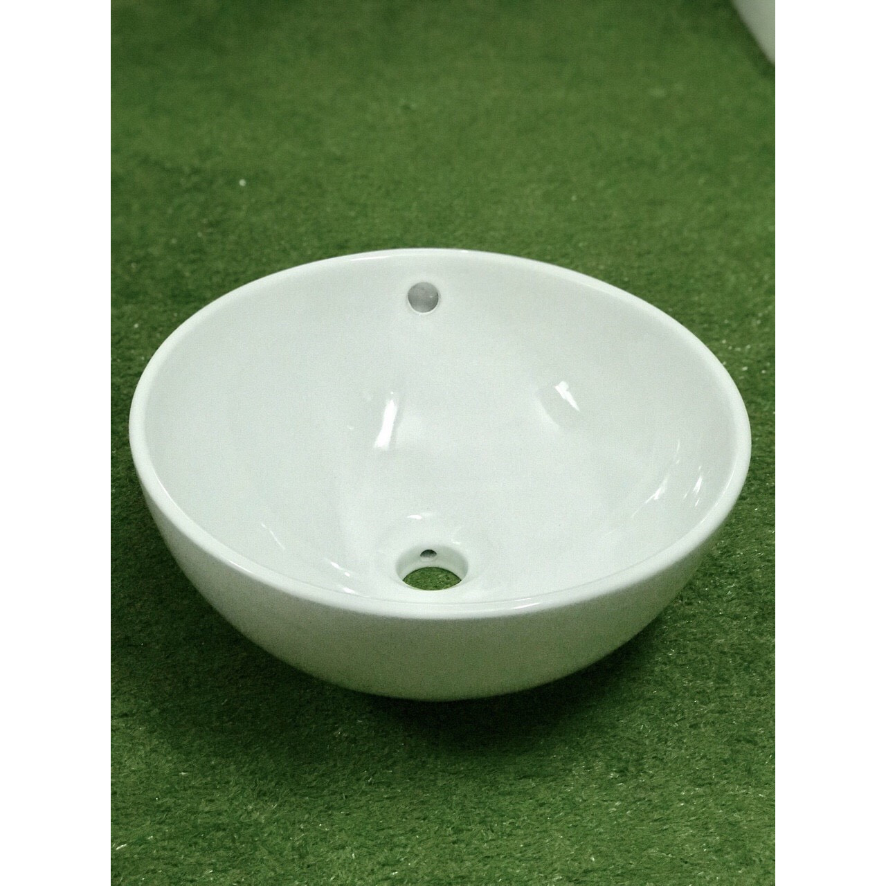 Lavabo men sứ cao cấp để bàn hình tròn HNP00012