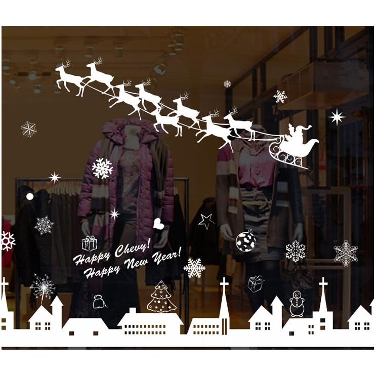 Decal trang trí noel thành phố tuyết và xe tuần lộc