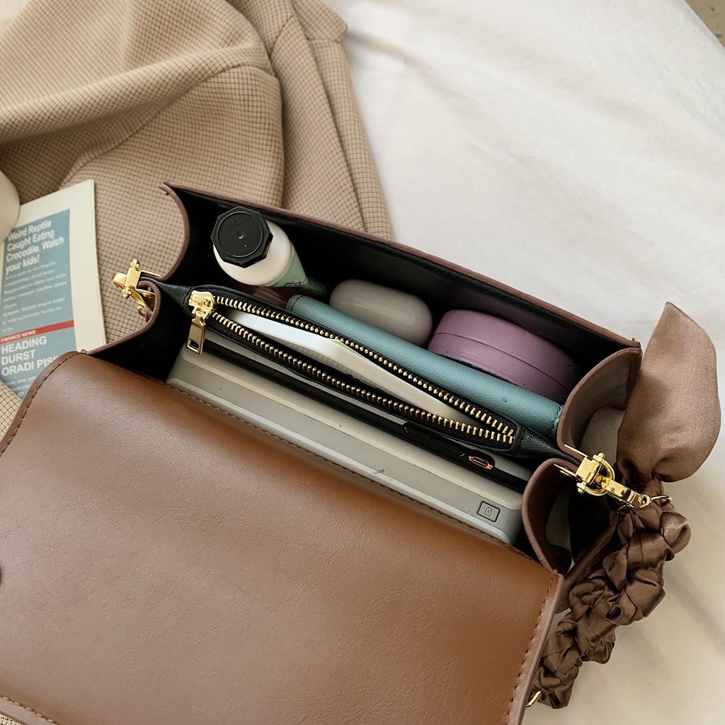 Túi da nữ họa tiết in chìm kute - MA279