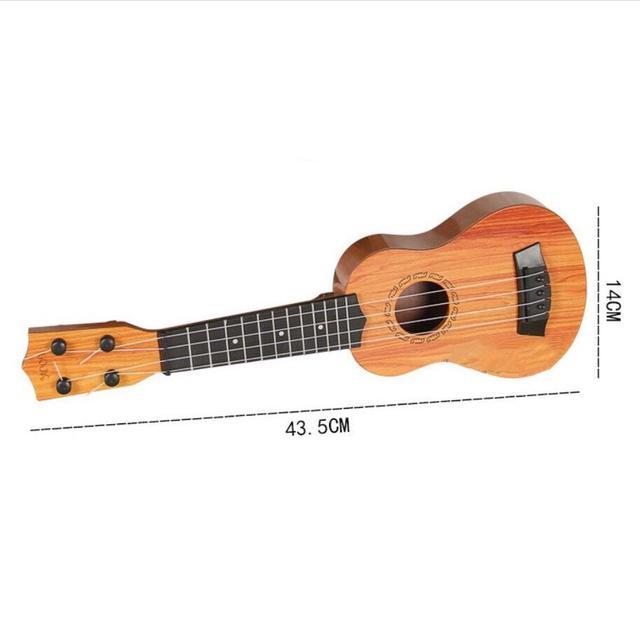 Đồ chơi đàn guitar mini vân gỗ cho trẻ tập chơi đàn