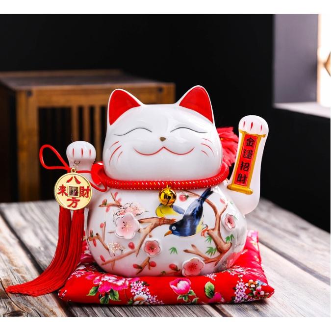 MÈO THẦN TÀI VẪY TAY. . Có vẫy tay: 22 cm - 26 cm Chất liệu gốm sứ Nhật Bản ( Mèo +hộp + nệm+ sạc điện )