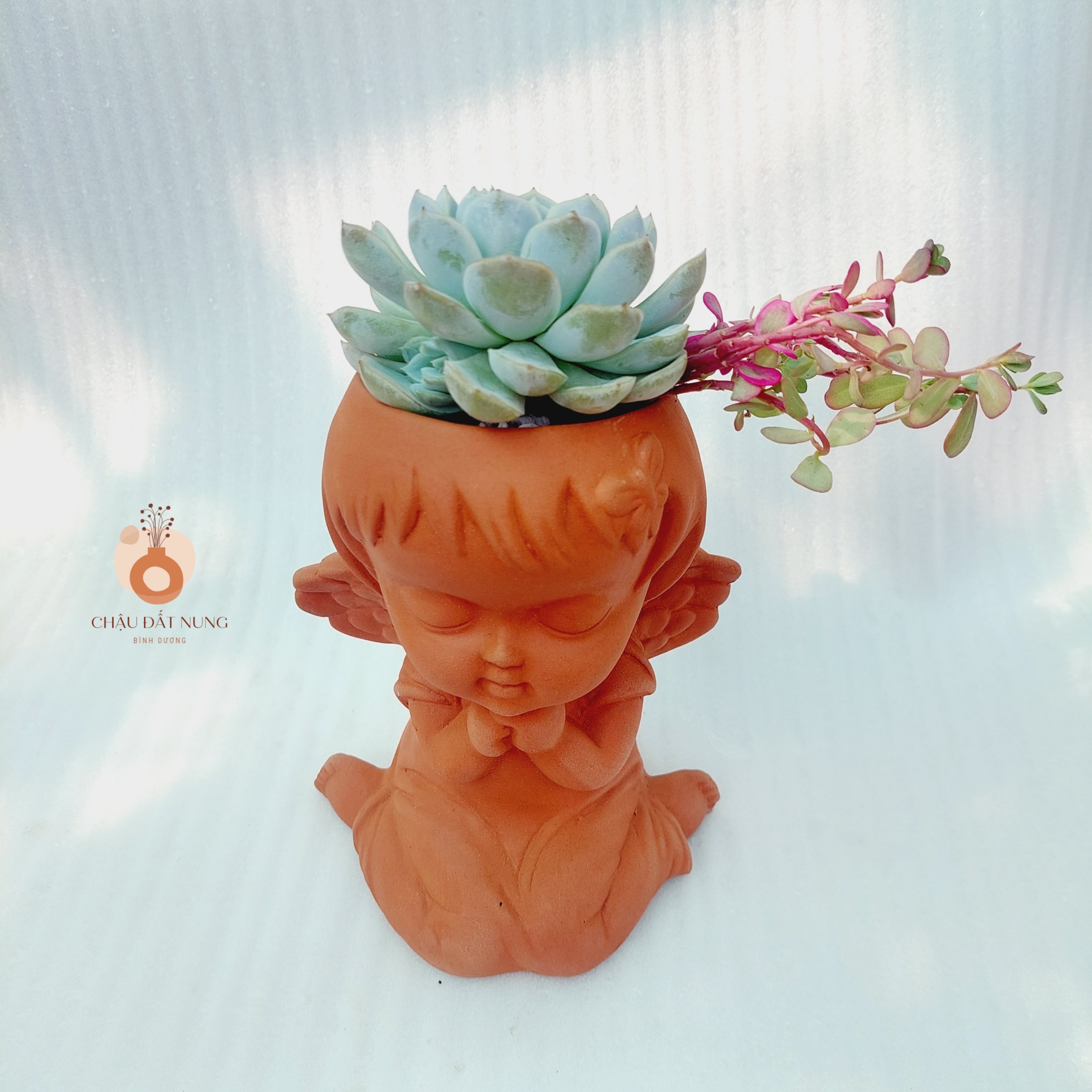 Chậu đất nung Bình Dương - Cô gái Marshal - miệng chậu 8cm, chiều cao 20cm