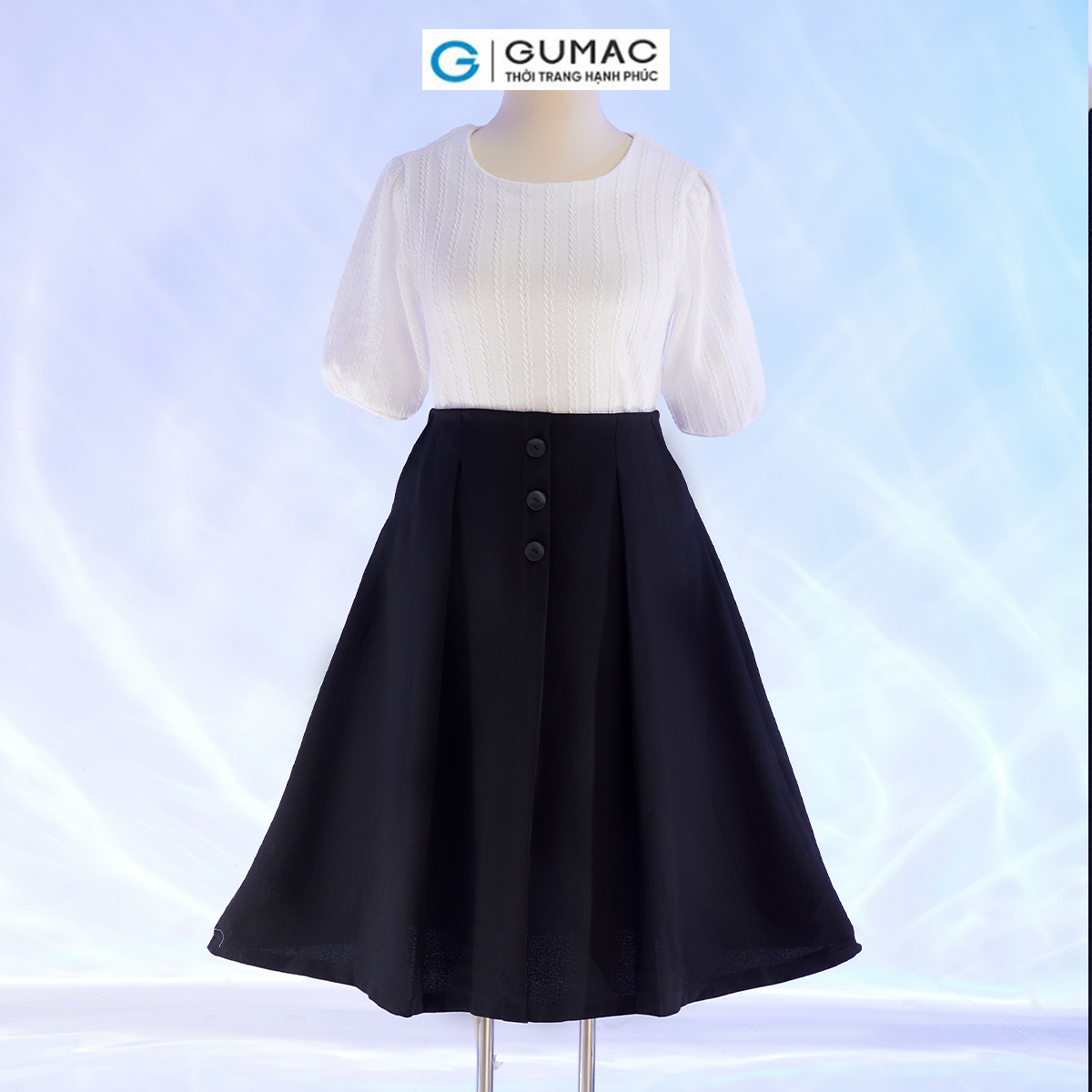 Chân váy A bigsize đính nút thời trang GUMAC VD10051