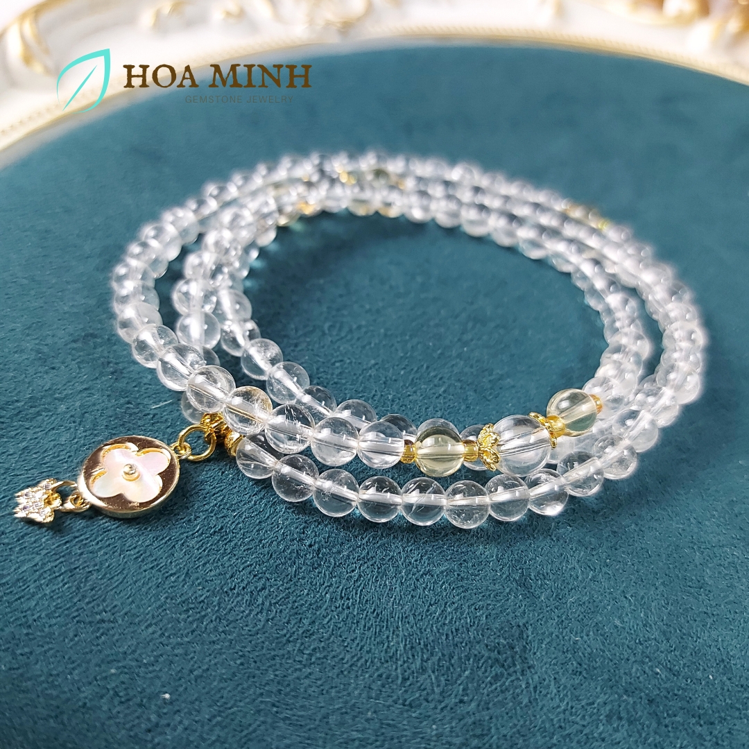 Vòng chuỗi 108 hạt Thạch Anh Trắng pha lê size hạt 6 li phối charm cỏ 4 lá và bướm nhỏ đính đá, ốp hoa, thạch anh vàng