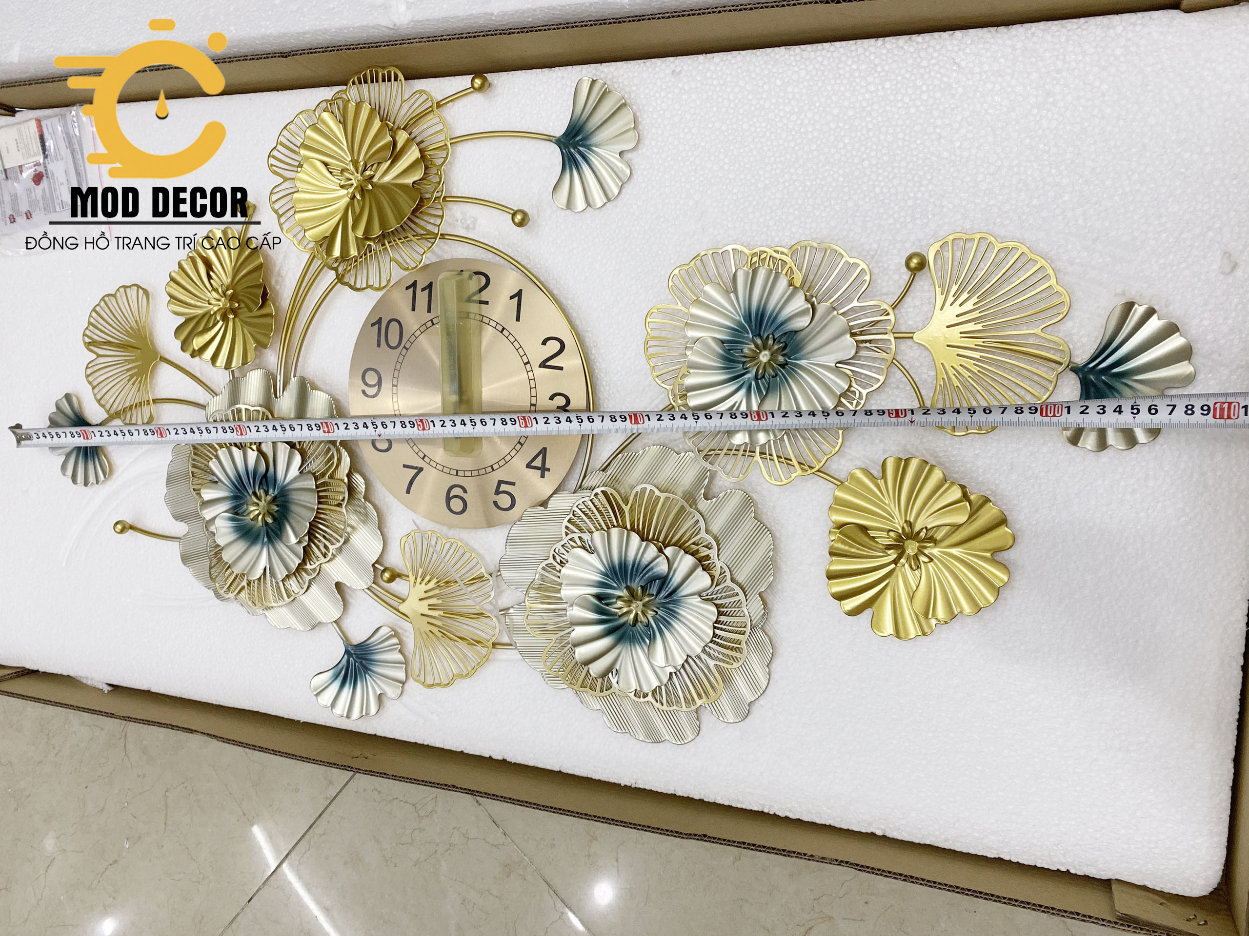 Đồng hồ treo tường kim trôi hoa mai vàng M2915 110*60cm