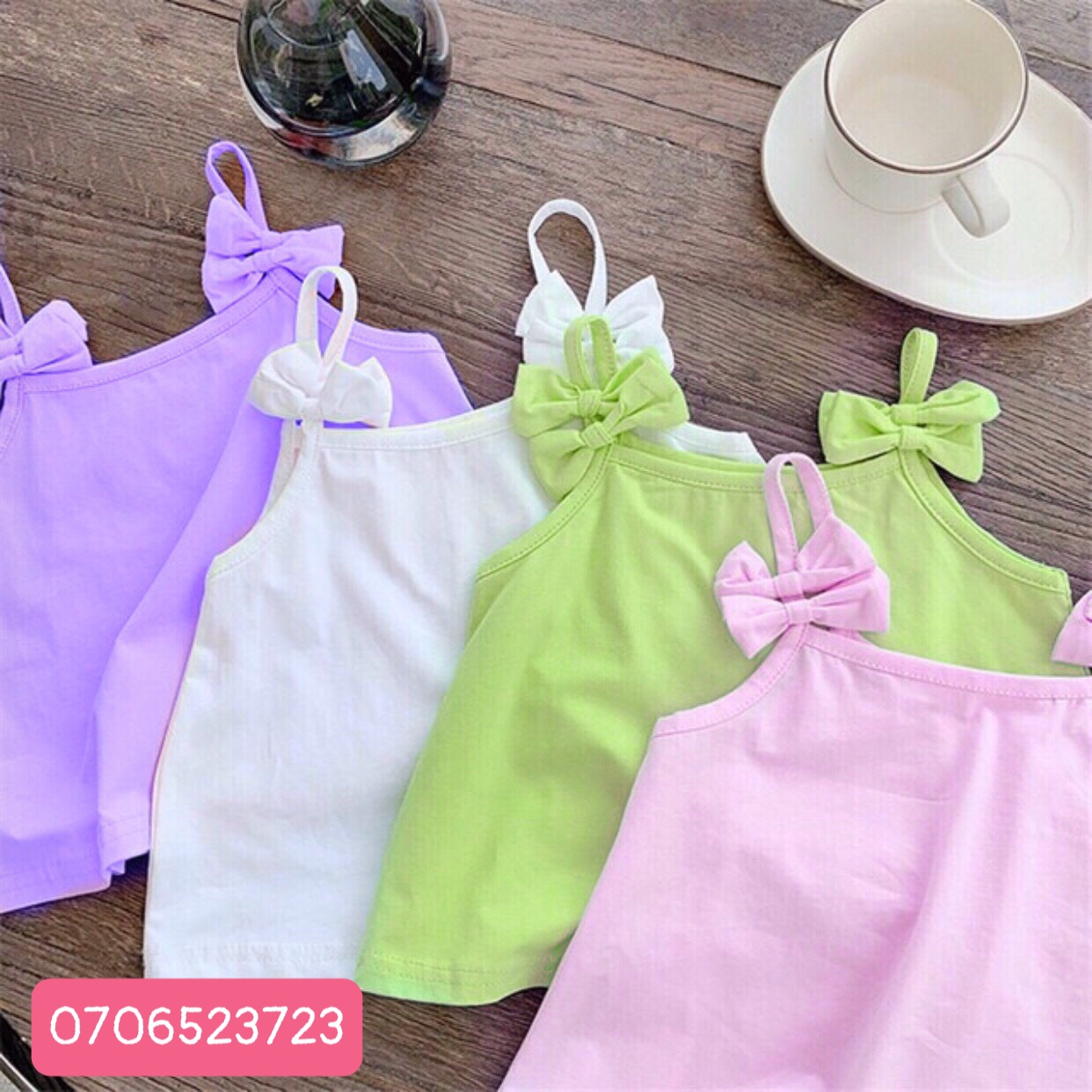 Áo thun 2 dây bé gái đính nơ dễ thương, dáng áo xòe thun cotton chính phẩm loại 1, mềm mịn mát cho bé 10kg đến 44kg