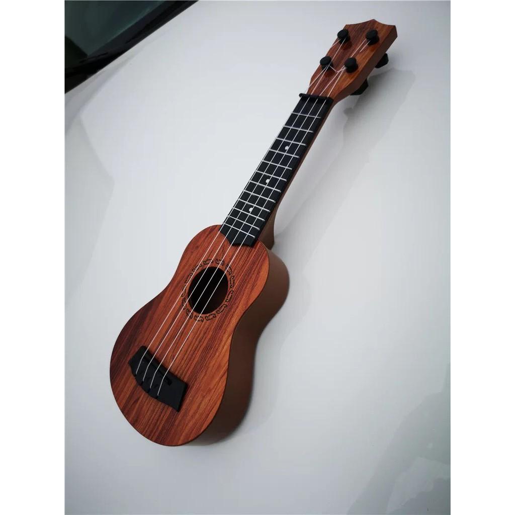 Đàn Ukulele Guitar Mini Đa Màu Sắc Kích Thích Sự Vui Chơi Của Bé Với Âm Nhạc, Đồ Chơi Bổ Ích Cho Bé Yêu