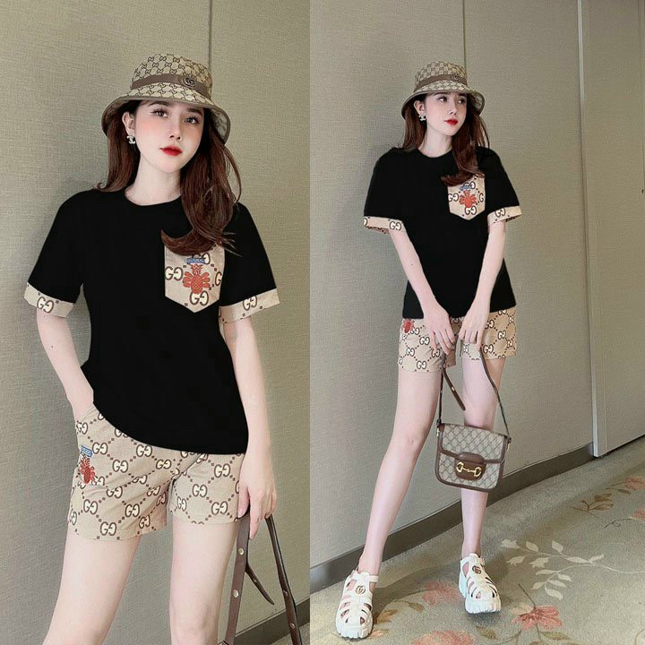 Đồ bộ thun đùi họa tiết logo thêu phối túi (2 màu 4 size)