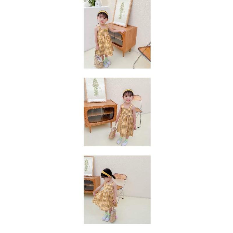 Váy kẻ caro vàng V18