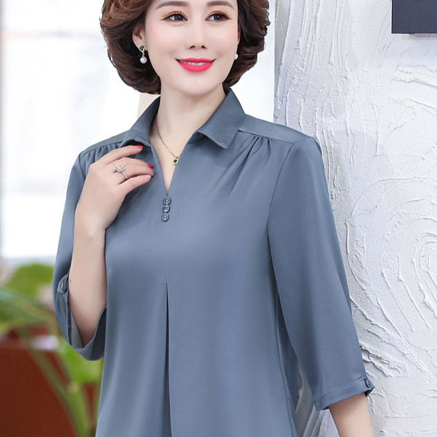 Áo sơ mi trung niên vai rúm mềm mại.