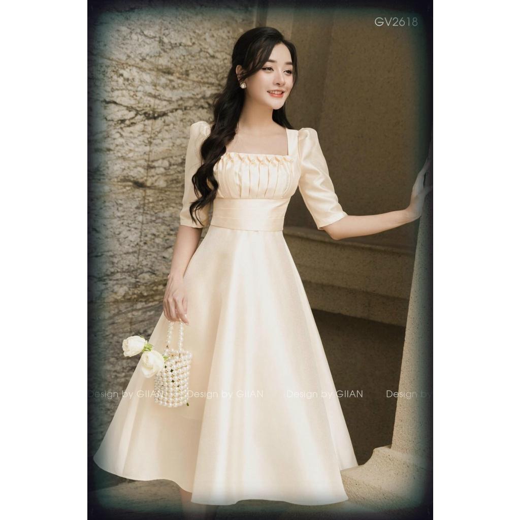 Đầm xoè cổ vuông tay phồng xếp ly ngực đính cườm sang trọng