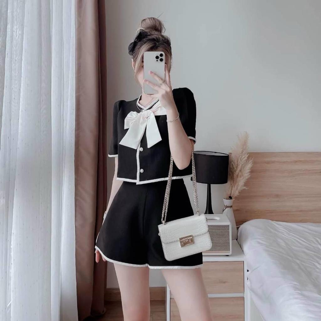 Sét áo viền lửng cài nút kèm nơ và quần sooc ngắn