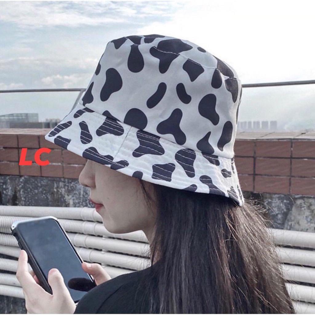 Mũ Vành Rộng In Họa Tiết Bò Sữa - Rere.Store - Nón bucket hai màu đen trắng Ulzzang