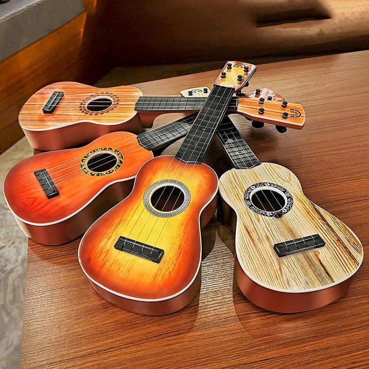 Đồ Chơi Đàn Ukulele Mini Cho Bé - Giúp Bé Phát Triển Âm Nhạc - Đồ Chơi Cho Bé Trai Bé Gái Thông Minh