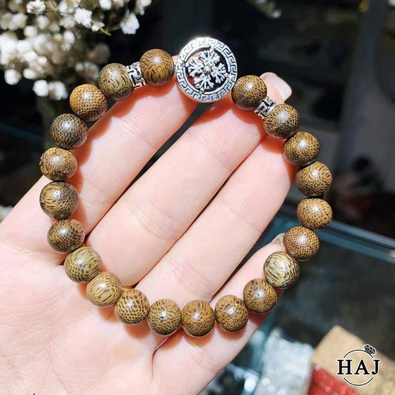 VÒNG TAY TRẦM HƯƠNG 8LI CHARM BÁNH XE PHÁP LUÂN BẠC