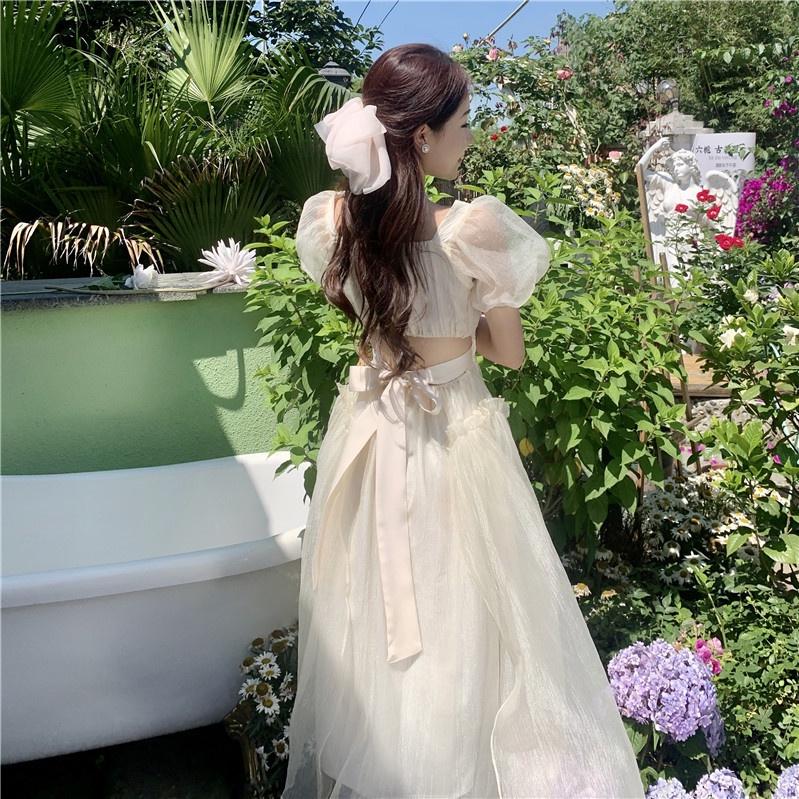 Váy đầm trắng thiết kế đi biển nữ đẹp cổ vuông tiểu thư thắt nơ cúp ngực maxi dài rộng bigsize kiểu vintage hở lưng