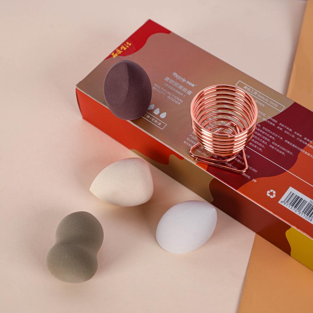 Hộp 4 bông mút tán kem + kệ đựng