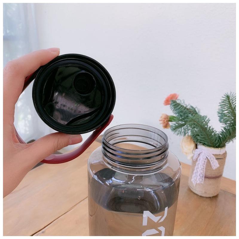 Bình Nước Thể Thao Bằng Nhựa Sức Chứa Lớn Chống Rơi Chống Nổ Có Quai Cầm Dành Cho Nam Và Nữ